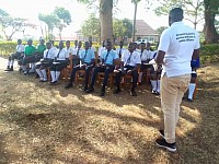 STUDENTS IN THE CONFERENCE BRIEFING AT THE SCHOL